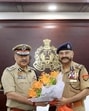 New UP Director General of Police Rajeev Krishna, left, with outgoing DGP Prashant Kumar after he assumed charge of the office, in Lucknow on Saturday. (PTI PHOTO) New UP Director General of Police Rajeev Krishna, left, with outgoing DGP Prashant Kumar after he assumed charge of the office, in Lucknow on Saturday. (PTI PHOTO)