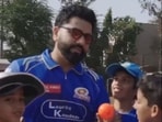 Rohit Sharma shared a lighthearted moment with a young fan. Rohit Sharma shared a lighthearted moment with a young fan.