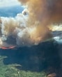 Smoke rises from the Hubert Lake wildfire WWF023, which forced the evacuation of the Hubert Lake Provincial Park area west of Fawcett, Alberta, Canada. (via REUTERS)