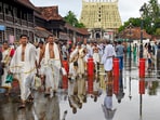 Thiruvananthapuram: People at the premises of Sree Padmanabhaswamy Temple after rainfall, in Thiruvananthapuram, Friday, May 23, 2025. Thiruvananthapuram: People at the premises of Sree Padmanabhaswamy Temple after rainfall, in Thiruvananthapuram, Friday, May 23, 2025.