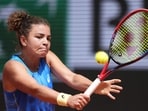 Italy's Jasmine Paolini plays a backhand return to Elina Svitolina during their women's singles match on day 8 of the French Open tennis tournament Italy's Jasmine Paolini plays a backhand return to Elina Svitolina during their women's singles match on day 8 of the French Open tennis tournament