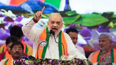 Kolkata: Union Home Minister and senior BJP leader Amit Shah addresses an organisational meeting of the party at Netaji Indoor Stadium in Kolkata, Sunday, June 1, 2025. (PTI) Kolkata: Union Home Minister and senior BJP leader Amit Shah addresses an organisational meeting of the party at Netaji Indoor Stadium in Kolkata, Sunday, June 1, 2025. (PTI)