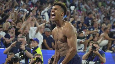 Paris St-Germain's 19-year-old Desire Doue celebrates his first of two goals in the 5-0 Champions League final win over Inter Milan at the Allianz Arena in Munich on Saturday. (AP) Paris St-Germain's 19-year-old Desire Doue celebrates his first of two goals in the 5-0 Champions League final win over Inter Milan at the Allianz Arena in Munich on Saturday. (AP)