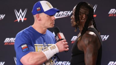John Cena fought R-Truth in the latter's last WWE bout (X) John Cena fought R-Truth in the latter's last WWE bout (X)