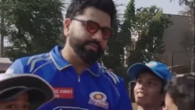 Rohit Sharma shared a lighthearted moment with a young fan. Rohit Sharma shared a lighthearted moment with a young fan.