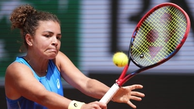 Italy's Jasmine Paolini plays a backhand return to Elina Svitolina during their women's singles match on day 8 of the French Open tennis tournament (AFP) Italy's Jasmine Paolini plays a backhand return to Elina Svitolina during their women's singles match on day 8 of the French Open tennis tournament (AFP)