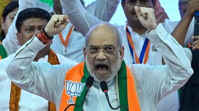 Union home minister Amit Shah addressing BJP members at Netaji Indoor Stadium in Kolkata on Sunday. (Samir Jana/ Hindustan Times) Union home minister Amit Shah addressing BJP members at Netaji Indoor Stadium in Kolkata on Sunday. (Samir Jana/ Hindustan Times)