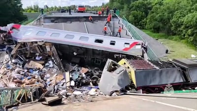 This video grab from a handout footage released by Russia's emergency ministry on June 1, 2025 shows specialists working at the scene after a road bridge collapsed onto a railway line late on May 31, 2025, derailing a passenger train heading to Moscow, in the Bryansk region. (AFP) This video grab from a handout footage released by Russia's emergency ministry on June 1, 2025 shows specialists working at the scene after a road bridge collapsed onto a railway line late on May 31, 2025, derailing a passenger train heading to Moscow, in the Bryansk region. (AFP)