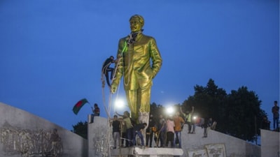 Protesters try to demolish a large statue of Sheikh Mujibur Rahman after Sheikh Hasina's ouster (AP/Rajib Dhar) Protesters try to demolish a large statue of Sheikh Mujibur Rahman after Sheikh Hasina's ouster (AP/Rajib Dhar)
