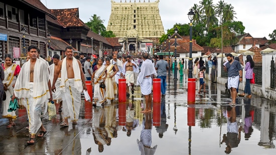 Thiruvananthapuram: People at the premises of Sree Padmanabhaswamy Temple after rainfall, in Thiruvananthapuram, Friday, May 23, 2025. (PTI)