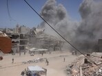 Smoke billows following an Israeli strike on a house west of Jabalia, in the northern Gaza Strip. Smoke billows following an Israeli strike on a house west of Jabalia, in the northern Gaza Strip.
