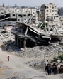 Palestinians next to the rubble of houses destroyed in Israel's military offensive in the Gaza Strip on October 7, 2024. (REUTERS/Mohammed Salem/File Photo) Palestinians next to the rubble of houses destroyed in Israel's military offensive in the Gaza Strip on October 7, 2024. (REUTERS/Mohammed Salem/File Photo)