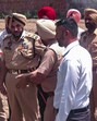 Senior police officials at the site after Amritsar police commissionerate arrests two associated with a terror and extortion module linked to Babbar Khalsa International (BKI) operative Jeevan Fauji, in Amritsar on Sunday. (ANI)