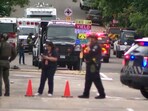 Police work at the scene after an attack that injured multiple people in Boulder, Colorado, U.S. June 1, 2025 in a still image from video. 