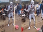 A viral video showed a man dressed as a Gandhi statue braving Nandi Hills' cold. A viral video showed a man dressed as a Gandhi statue braving Nandi Hills' cold.
