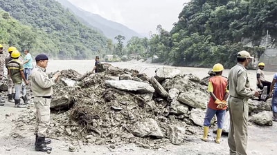 Restoration work underway, as the Phidang Bailey Bridge is partially damaged due to the current of the Teesta River, following heavy rainfall in the region, at Dzongu in North Sikkim on Sunday (ANI) Restoration work underway, as the Phidang Bailey Bridge is partially damaged due to the current of the Teesta River, following heavy rainfall in the region, at Dzongu in North Sikkim on Sunday (ANI)