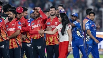 Punjab Kings' co-owner Preity Zinta meets with her team's players at the end of second Qualifier cricket match between Punjab Kings and Mumbai Indians. (Photo by Arun SANKAR / AFP) (AFP) Punjab Kings' co-owner Preity Zinta meets with her team's players at the end of second Qualifier cricket match between Punjab Kings and Mumbai Indians. (Photo by Arun SANKAR / AFP) (AFP)