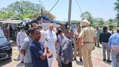 Residents gather at Nangal village in Phillaur sub division of Jalandhar district after the statue of BR Ambedkar was vandalised on Monday. (HT Photo) Residents gather at Nangal village in Phillaur sub division of Jalandhar district after the statue of BR Ambedkar was vandalised on Monday. (HT Photo)