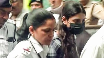 Sharmistha Panoli, arrested from Gurugram by Kolkata Police for allegedly hurting religious sentiments through her comments on social media being produced in Alipore Court, in Kolkata on Saturday. (ANI grab) Sharmistha Panoli, arrested from Gurugram by Kolkata Police for allegedly hurting religious sentiments through her comments on social media being produced in Alipore Court, in Kolkata on Saturday. (ANI grab)