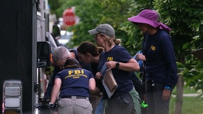 An FBI team investigating an attack on demonstrators calling for the release of Israeli hostages held in Gaza, at the scene on Pearl Street in Boulder, Colorado, on June 1, 2025. (Photo by Eli Imadali / AFP) (AFP) An FBI team investigating an attack on demonstrators calling for the release of Israeli hostages held in Gaza, at the scene on Pearl Street in Boulder, Colorado, on June 1, 2025. (Photo by Eli Imadali / AFP) (AFP)