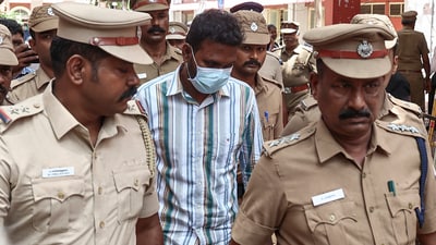 Gnanasekaran, convicted in the Anna University sexual assault case, being escorted by the police after he was sentenced to life imprisonment on Monday. (PTI) Gnanasekaran, convicted in the Anna University sexual assault case, being escorted by the police after he was sentenced to life imprisonment on Monday. (PTI)