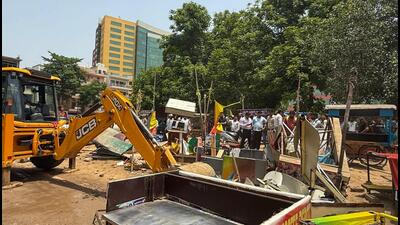the drive was carried out after the authority received several complaints from local residents about encroachments, illegal vends and random parking in the area, leading to traffic congestion. (Parveen Kumar/HT Photo) the drive was carried out after the authority received several complaints from local residents about encroachments, illegal vends and random parking in the area, leading to traffic congestion. (Parveen Kumar/HT Photo)