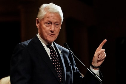 Former US President Bill Clinton boarded an unmarked aircraft in Bombay, now Mumbai. (REUTERS)