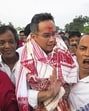 Congress leader Gaurav Gogoi being welcomed by party supporters on his way to Guwahati on Monday. (PTI)