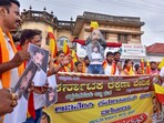 People take part in a protest against veteran actor Kamal Haasan over his controversial remarks about the Kannada language, in Chikkamagaluru, Karnataka, Friday. People take part in a protest against veteran actor Kamal Haasan over his controversial remarks about the Kannada language, in Chikkamagaluru, Karnataka, Friday.