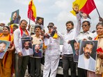 Kannada activists hold posters of actor Kamal Haasan during a protest against the latter for his remarks about the Kannada language, in Bengaluru. Kannada activists hold posters of actor Kamal Haasan during a protest against the latter for his remarks about the Kannada language, in Bengaluru.