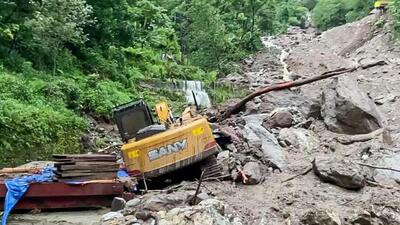A view of debris after landslides triggered by heavy rains hit the Theeng and Chungthang areas. (ANI photo)