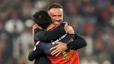 Royal Challengers Bengaluru's Virat Kohli (L) celebrates with his former teammate AB de Villiers after winning the Indian Premier League 2025. (AFP)
