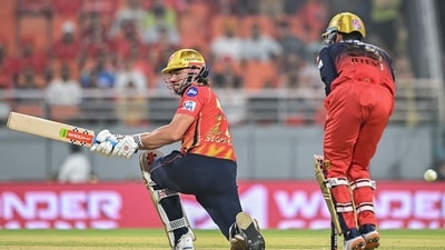 Punjab Kings' Marcus Stoinis (L) plays a shot during the Indian Premier League (IPL) Twenty20 first Qualifier cricket match between Punjab Kings and Royal Challengers Bengaluru (AFP) Punjab Kings' Marcus Stoinis (L) plays a shot during the Indian Premier League (IPL) Twenty20 first Qualifier cricket match between Punjab Kings and Royal Challengers Bengaluru (AFP)