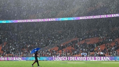 An umpire on the field during the rain delay at Narendra Modi Stadium during Qualifier 2. (AFP) An umpire on the field during the rain delay at Narendra Modi Stadium during Qualifier 2. (AFP)