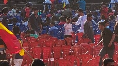 Bengaluru fans watch the match at an open screening at Vijayanagara's BGS ground. Bengaluru fans watch the match at an open screening at Vijayanagara's BGS ground.