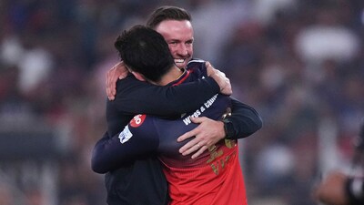 Royal Challengers Bengaluru's Virat Kohli, right, hugs to celebrate with former teammate AB de Villiers (AP) Royal Challengers Bengaluru's Virat Kohli, right, hugs to celebrate with former teammate AB de Villiers (AP)
