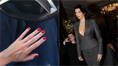 Kendall Jenner embracing short nails and office siren. Kendall Jenner embracing short nails and office siren.