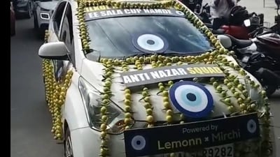 A car in Bengaluru was wrapped up with lemons and chillis to clear the 'nazar' factor of RCB. A car in Bengaluru was wrapped up with lemons and chillis to clear the 'nazar' factor of RCB.