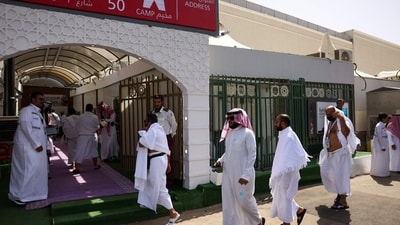 Muslim worshippers arrive at a camp housing pilgrims in Mina near Islam's holy city of Mecca on June 3, 2025, ahead of the annual Hajj pilgrimage. (AFP) Muslim worshippers arrive at a camp housing pilgrims in Mina near Islam's holy city of Mecca on June 3, 2025, ahead of the annual Hajj pilgrimage. (AFP)