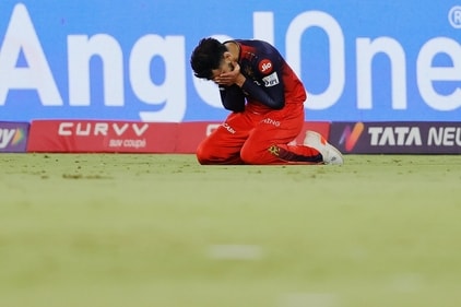 Virat Kohli sank to the ground after RCB's win. (Twitter) Virat Kohli sank to the ground after RCB's win. (Twitter)