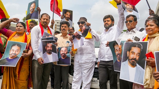 Bengaluru: Kannada activists hold posters of actor Kamal Haasan during a protest against the latter for his remarks about the Kannada language. (PTI)
