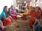 Tribal women make exquisite products with wild plants at Laukaria village in West Champaran district, Bihar, India, Monday,31, 2025.(Photo by / Hindustan Times)