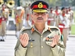 Field Marshal Syed Asim Munir prays after laying wreath on the martyrs' monument during a guard of honour ceremony at General Headquarters (GHQ) in Rawalpindi. Field Marshal Syed Asim Munir prays after laying wreath on the martyrs' monument during a guard of honour ceremony at General Headquarters (GHQ) in Rawalpindi.