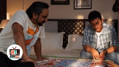 Aamir Khan and RS Prasanna on the set of Sitaare Zameen Par. Aamir Khan and RS Prasanna on the set of Sitaare Zameen Par.