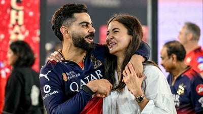 Virat Kohli and Anushka Sharma celebrate Royal Challengers Bengaluru clinching their first ever IPL trophy. (AFP) Virat Kohli and Anushka Sharma celebrate Royal Challengers Bengaluru clinching their first ever IPL trophy. (AFP)