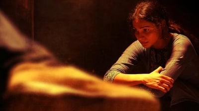 Andrea Jeremaiah in a still from Manushi, produced by Vetrimaaran. Andrea Jeremaiah in a still from Manushi, produced by Vetrimaaran.