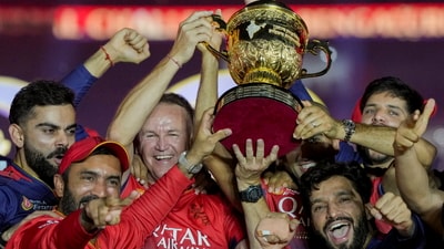 Ahmedabad: Royal Challengers Bengaluru's Head Coach Andy Flower, captain Rajat Patidar and others lift the IPL title (PTI) Ahmedabad: Royal Challengers Bengaluru's Head Coach Andy Flower, captain Rajat Patidar and others lift the IPL title (PTI)