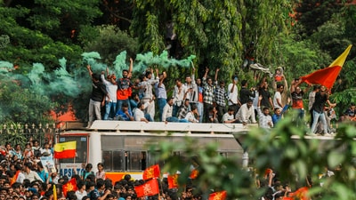 Fans release flares atop a bus during Royal Challengers Bengaluru's felicitation ceremony after the team won the Indian Premier League (IPL) 2025, at Vidhana Soudha, in Bengaluru, Karnataka, Wednesday, June 4, 2025. (PTI) Fans release flares atop a bus during Royal Challengers Bengaluru's felicitation ceremony after the team won the Indian Premier League (IPL) 2025, at Vidhana Soudha, in Bengaluru, Karnataka, Wednesday, June 4, 2025. (PTI)