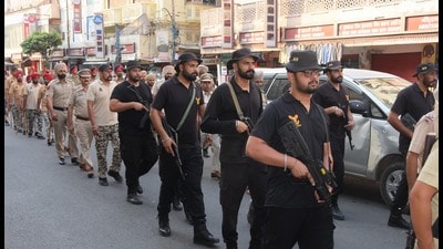 Police personnel during a flag march ahead of the Operation Bluestar anniversary in Amritsar on Wednesday. (Sameer Sehgal/HT) Police personnel during a flag march ahead of the Operation Bluestar anniversary in Amritsar on Wednesday. (Sameer Sehgal/HT)