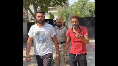 The accused in police custody on Wednesday. (HT Photo) The accused in police custody on Wednesday. (HT Photo)